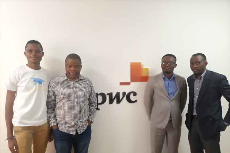 David Muanda from Friendina College poses for a picture with Elisée Kiluba, Thierry Nduu, and Joseph Mukozi of PwC