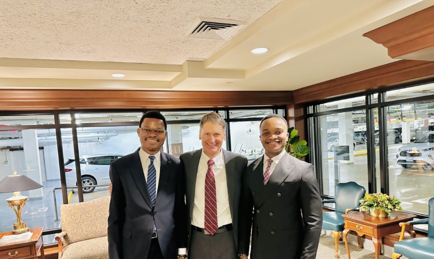 David Muanda and Lievin Kasaka meeting Carl B. Cook in Salt Lake City, Utah