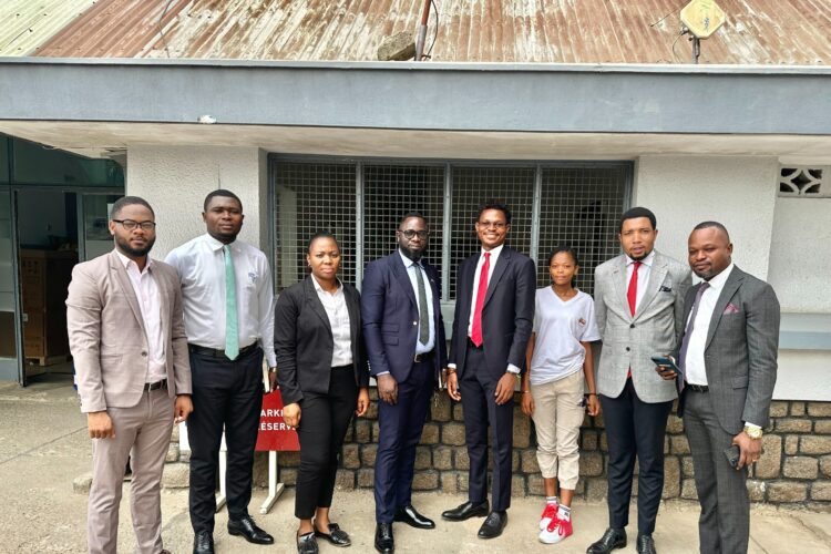 Family picture: David Muanda, CEO of Friendina College, met with EquityBCDC staff in Kananga, the Democratic Republic of the Congo