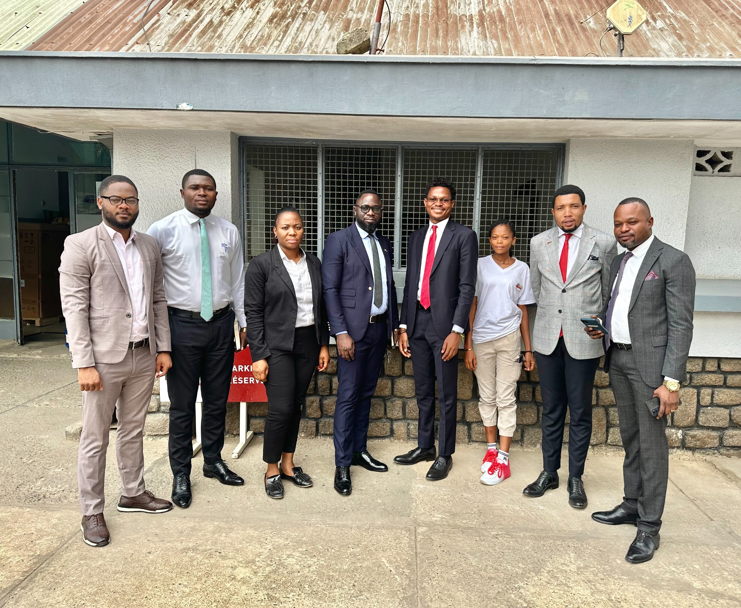 Family picture: David Muanda, CEO of Friendina College, met with EquityBCDC staff in Kananga, the Democratic Republic of the Congo