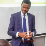 David Muanda, CEO at Friendina College, is conducting the meeting at Baobab RDC