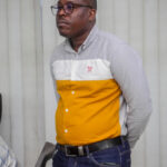 Yannick Bolaluete attending the meeting at Baobab RDC being conducted by David Muanda, CEO at Friendina College
