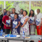 Attendees at Baobab RDC are posing for a family photo after receiving their Certificates from David Muanda, CEO at Friendina College
